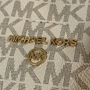 Michael Kors, gray and white logo purse.